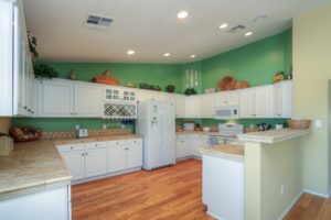 Kitchen, White Cabinets, Recessed Lighting, Tiled Counter-tops