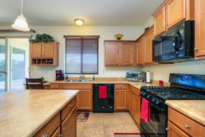 Kitchen, Black Appliances, Tile Flooring